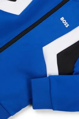 Chaqueta con cremallera para niños con rayas y detalles de logo