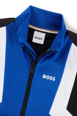 Chaqueta con cremallera para niños con rayas y detalles de logo