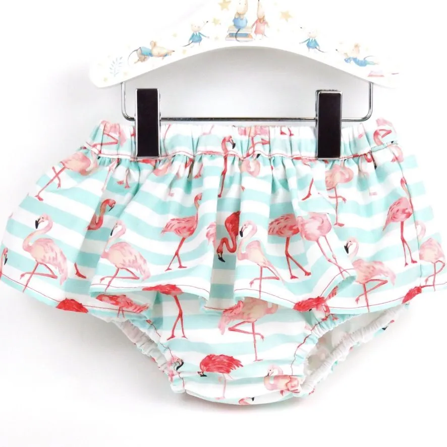 Cubrepañal con falda flamencos mint