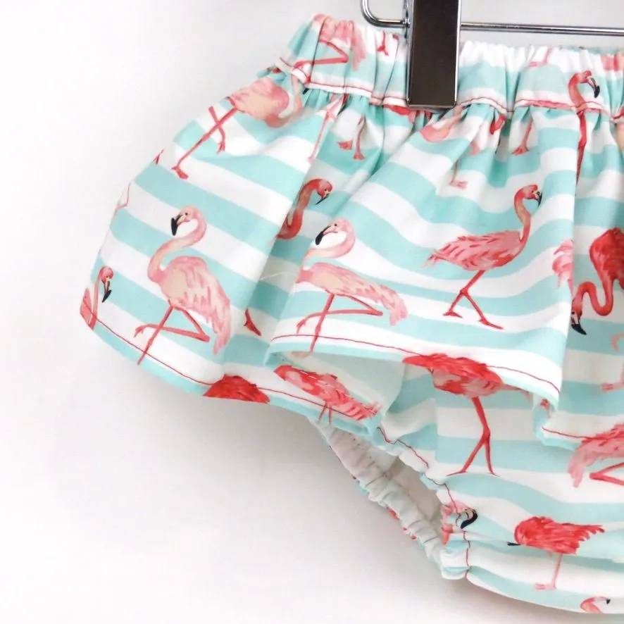 Cubrepañal con falda flamencos mint