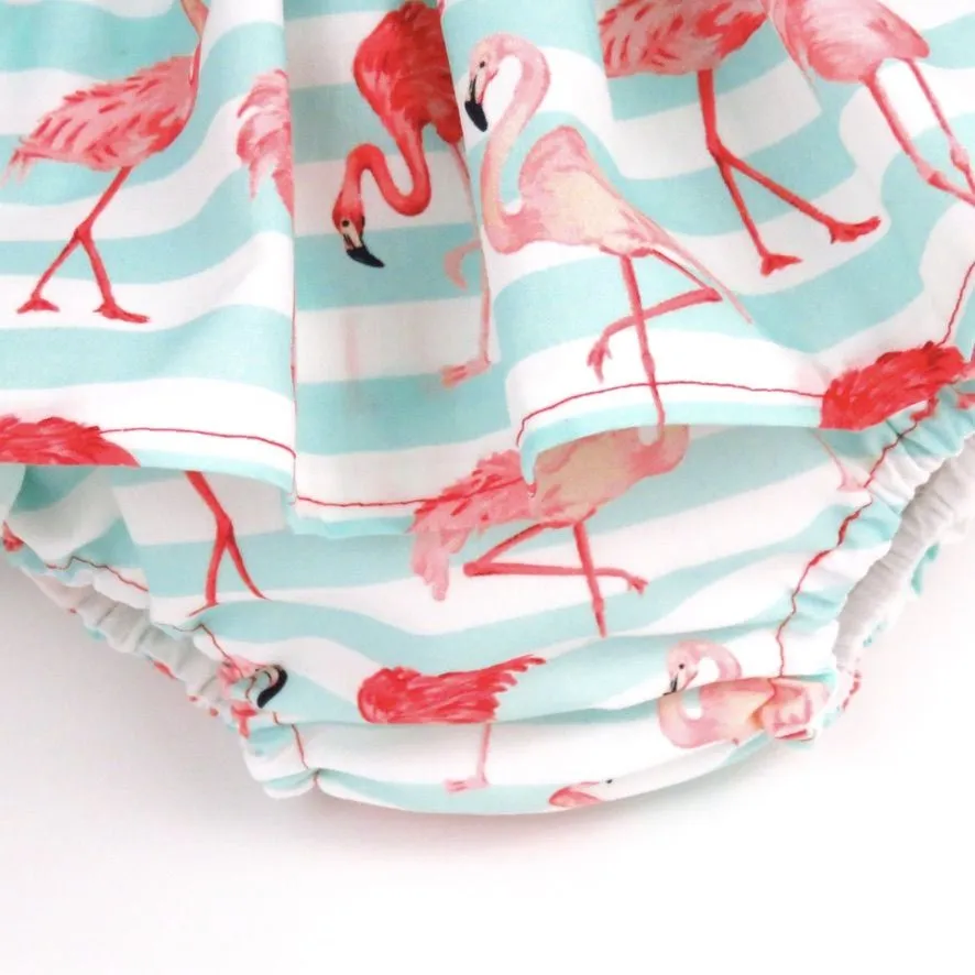 Cubrepañal con falda flamencos mint