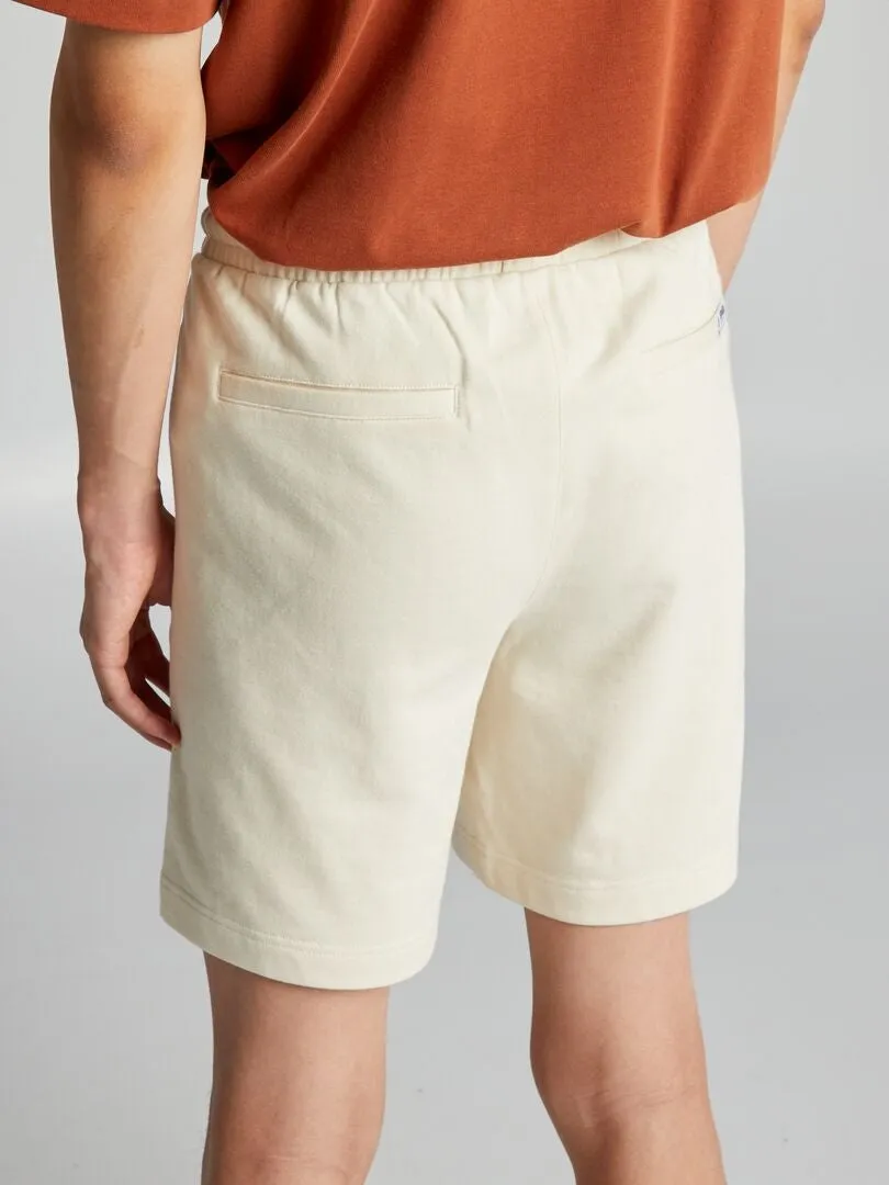 PANTALóN CORTO DE CHáNDAL CON BOLSILLOS CON CREMALLERA  BEIGE