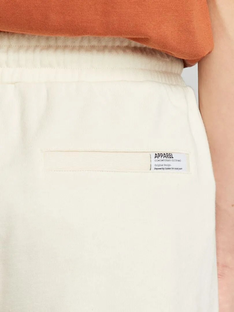 PANTALóN CORTO DE CHáNDAL CON BOLSILLOS CON CREMALLERA  BEIGE